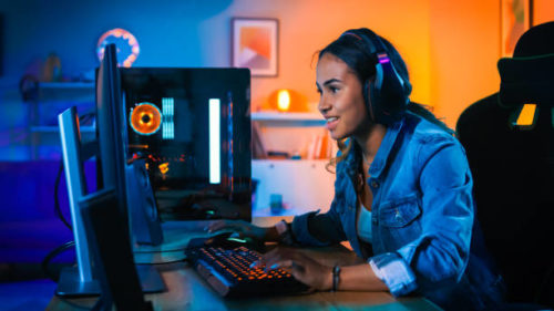 A gamer girl playing on PC - Does RAM Speed Matter for Gaming - thegamerian.com best gaming blog